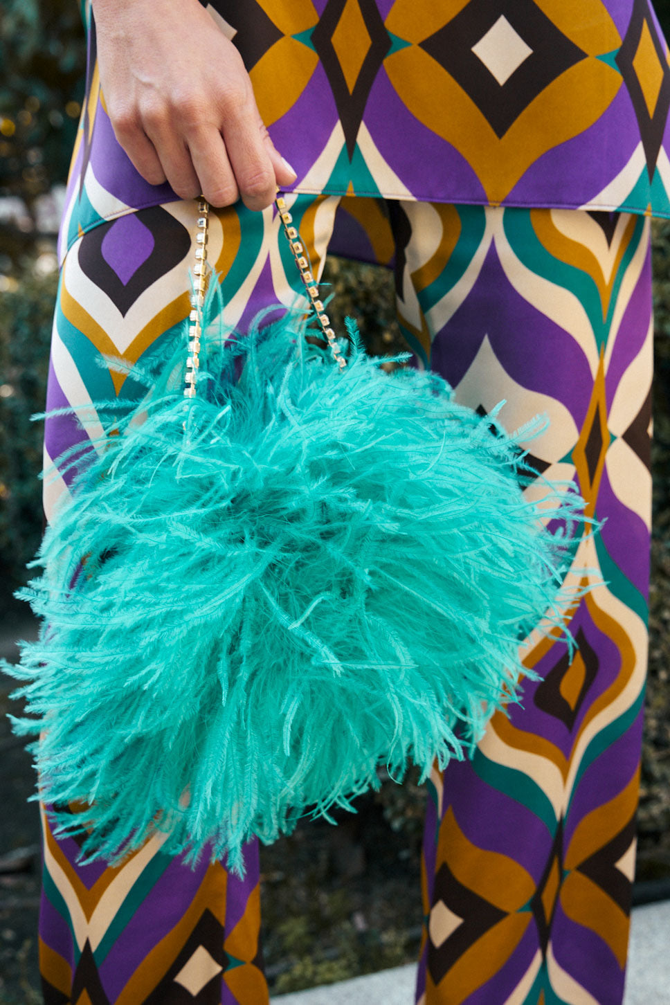 Bolsito plumas joya turquesa