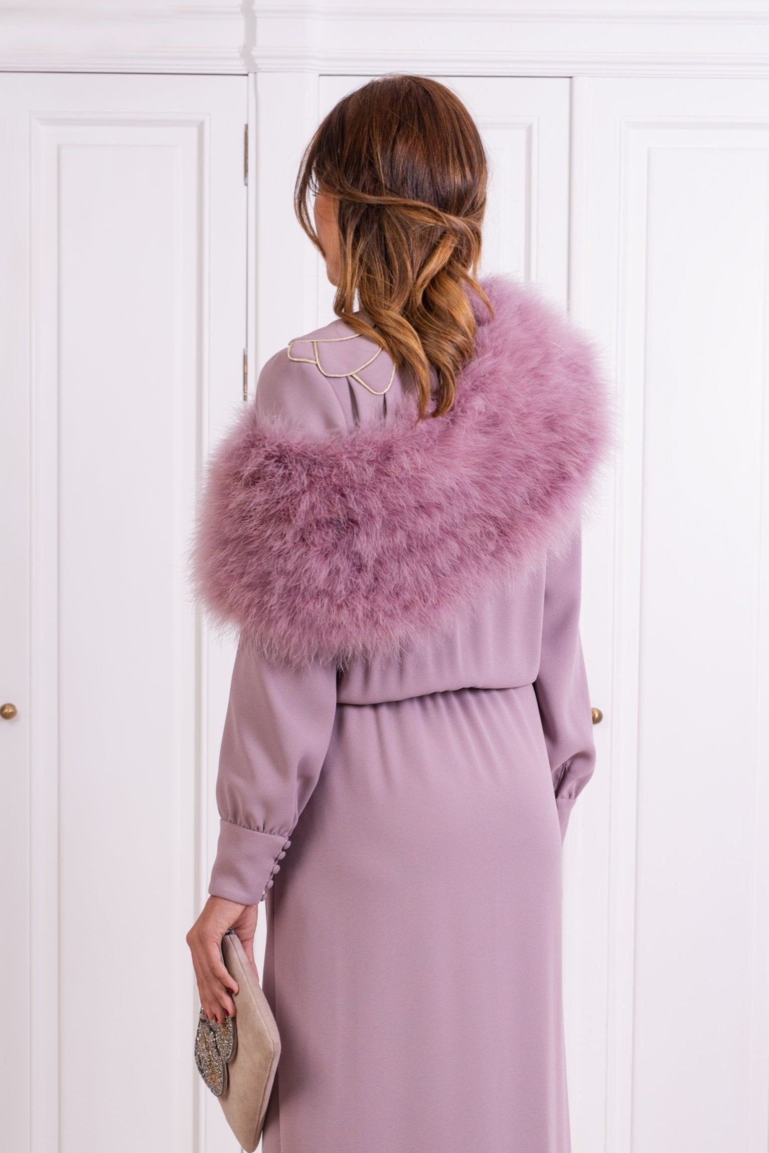 Estola plumas púrpura