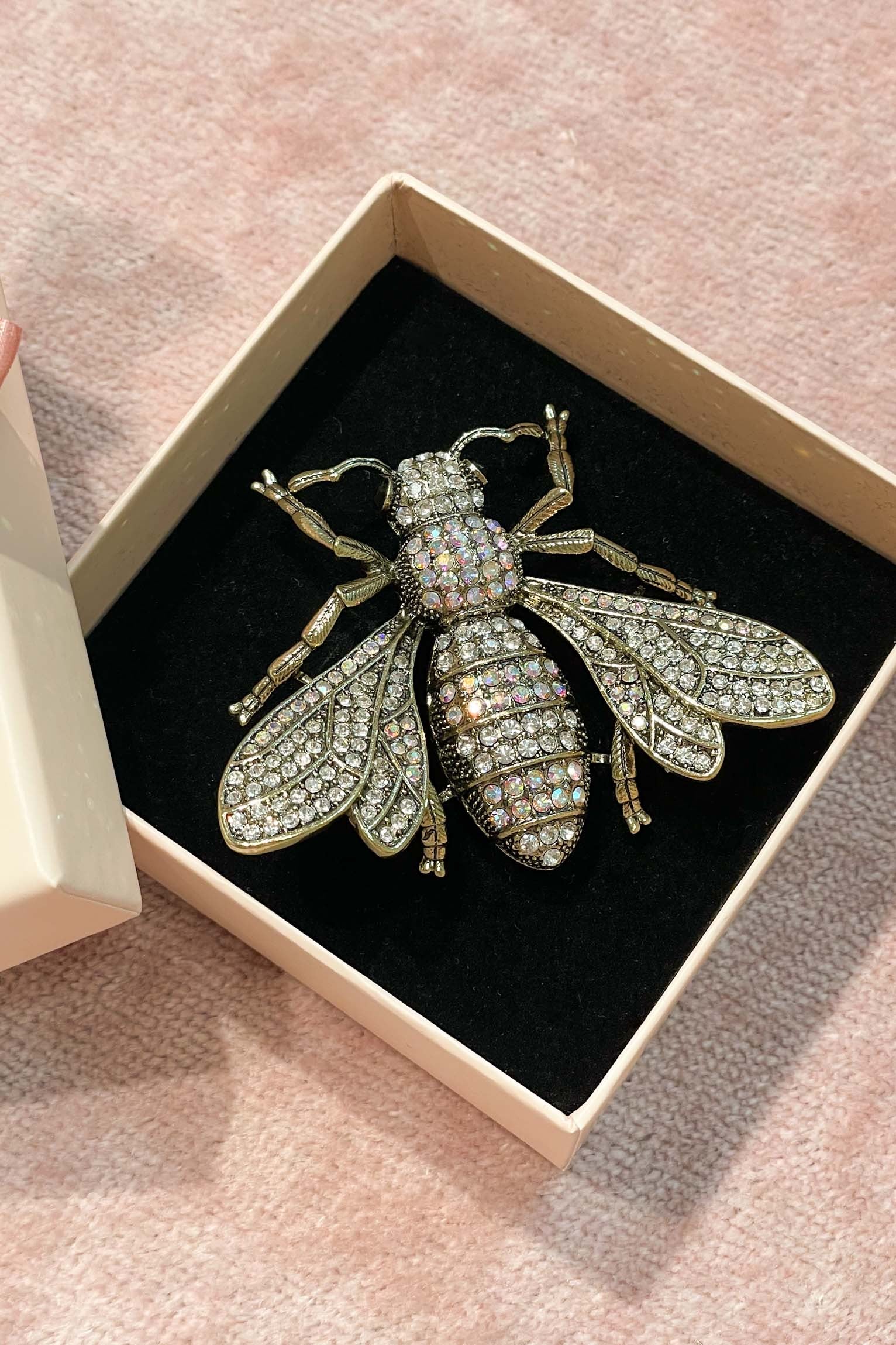 Broche insecto dorado